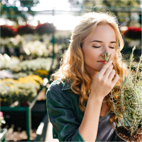 young-woman-with-beautiful-blond-hair-gentle-smile-dressed-green-robe-with-belt-is-working-greenhouse-1000x1000.jpg